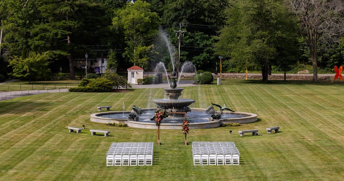 The Tupper Manor fountain with the mansion behind it