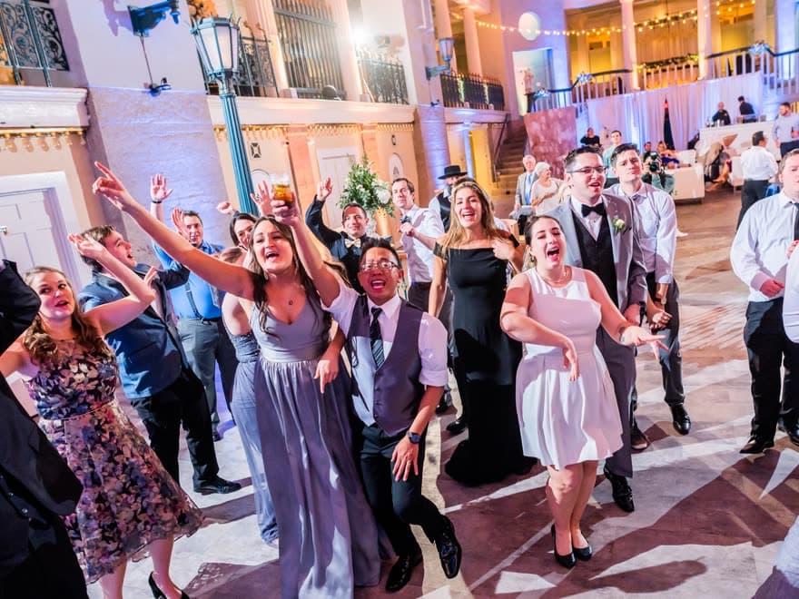 A packed wedding dance floor at a Boston ballroom
