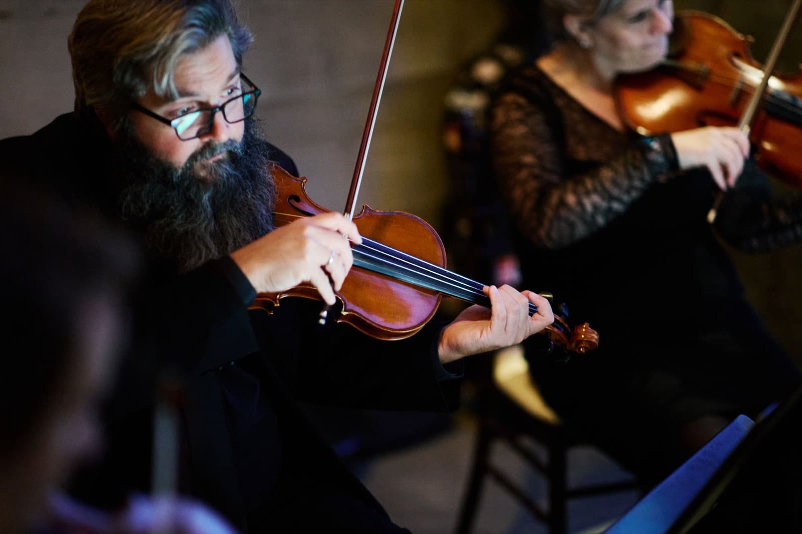 A violinist and a violist playing at a Crane Estate wedding