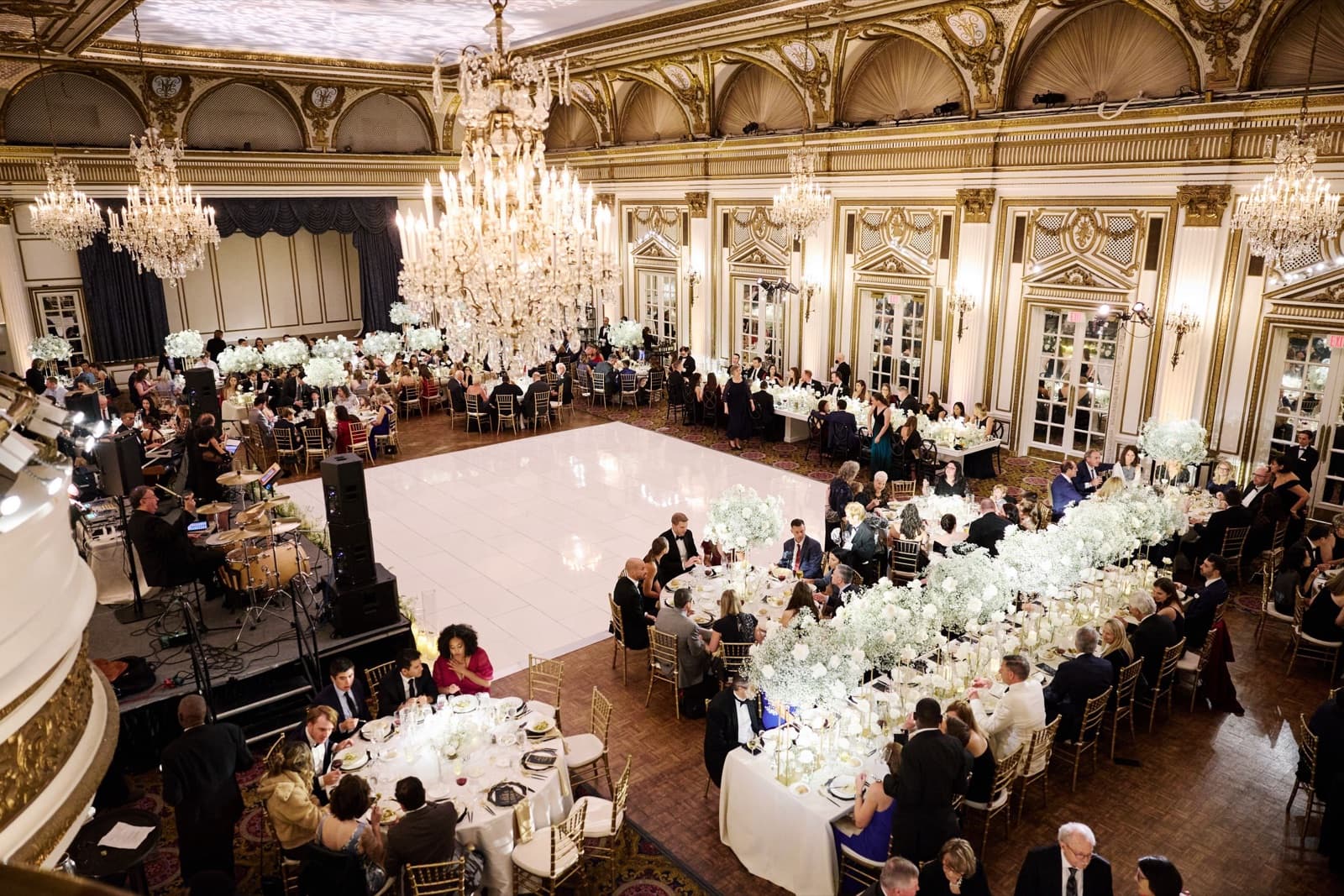 The Grand Ballroom at the Fairmont Copley Plaza full of guests at dinner, without uplighting