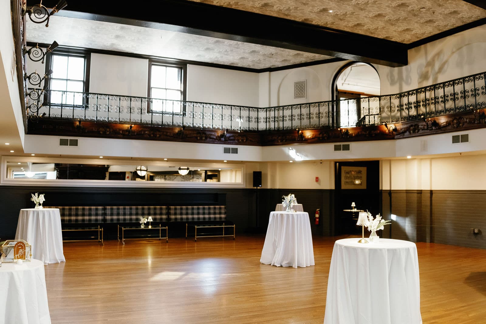 The first-floor cocktail space at The Tower set with high-top tables before guests arrive