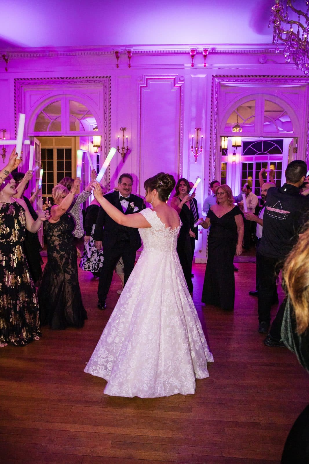 The Tupper Manor ballroom washed in purple uplighting during the dance set