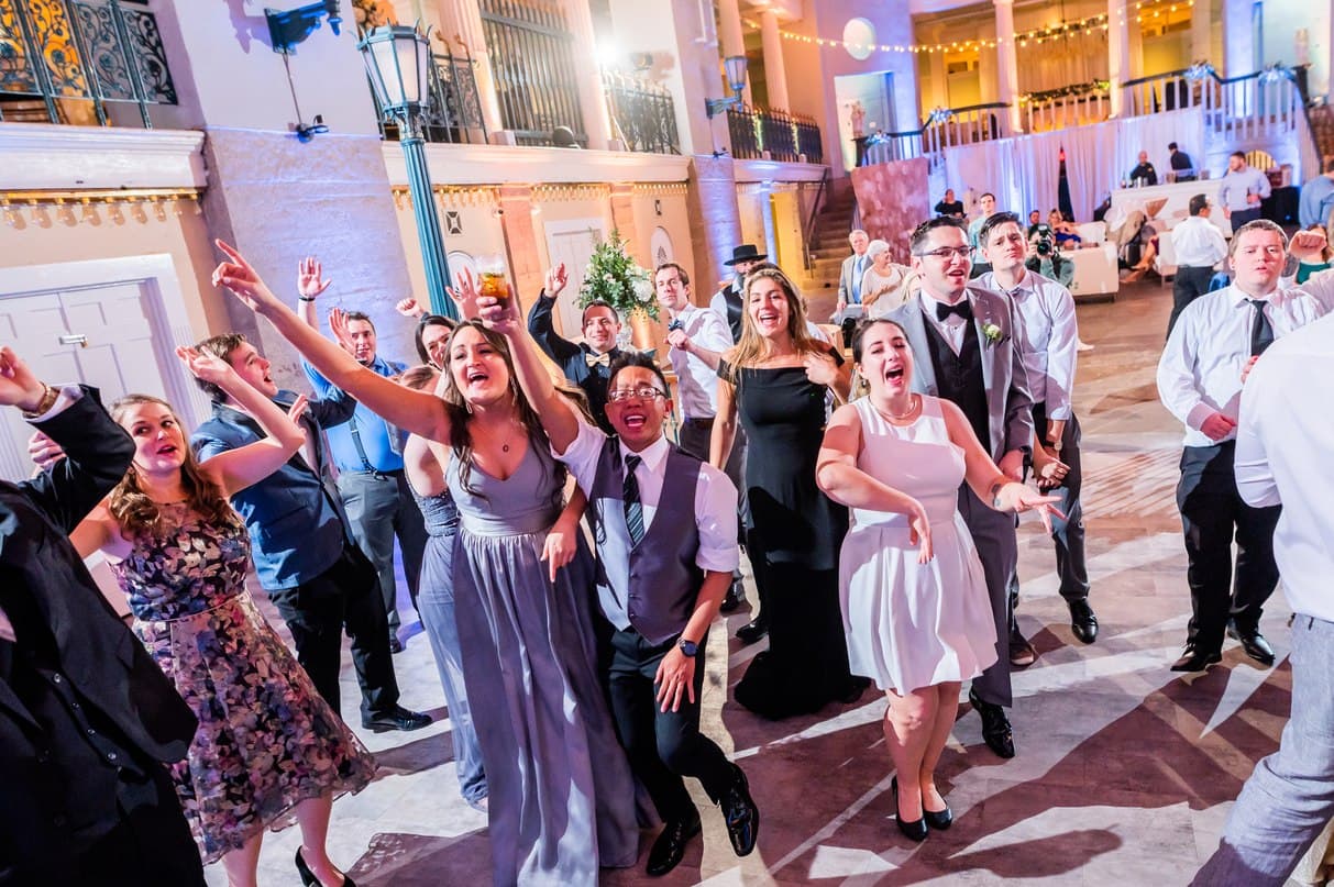 Packed dance floor at a Willowdale Estate winter wedding, seen from above
